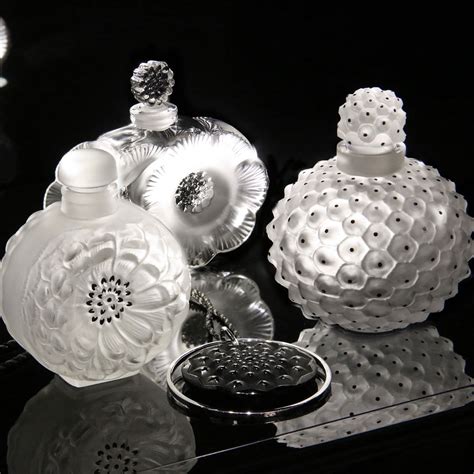 lalique glass perfume bottle with overall flower design